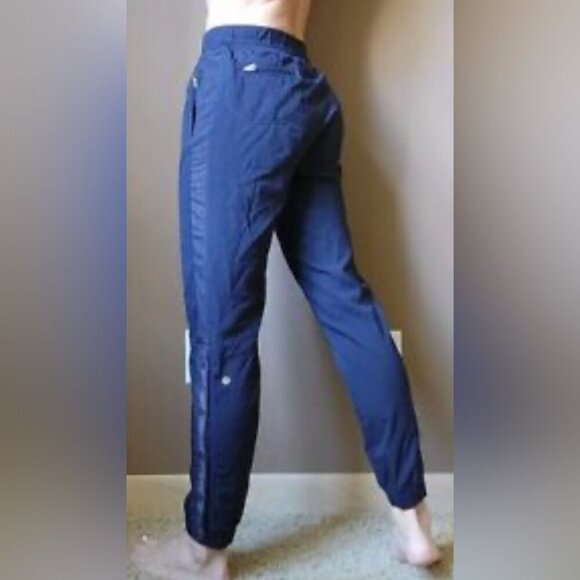 Lululemon Leader of the Track bruised berry 2 side zipper gathered foot pant 10 - Picture 1 of 4